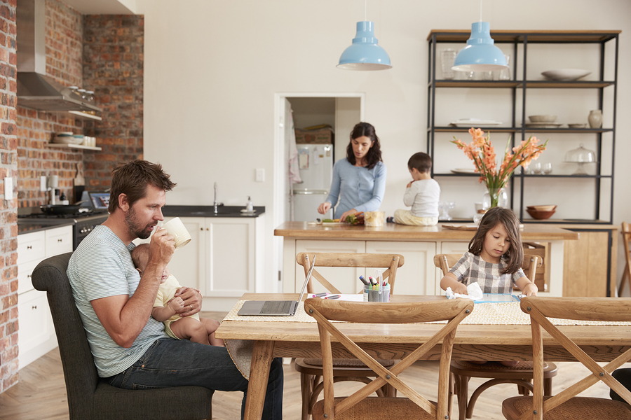 Photo Busy Family Home With Father Working As Mother Prepares Meal